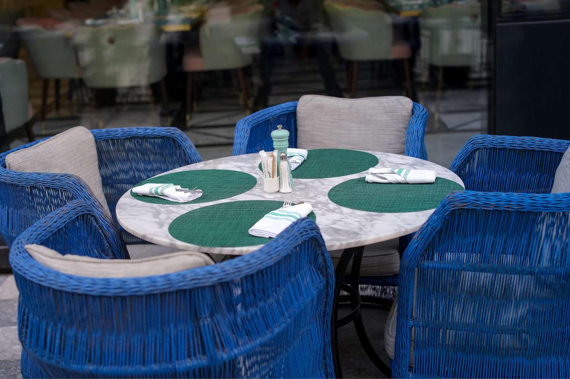 Mansard Riyadh, A Radisson Collection Hotel מראה חיצוני תמונה A table with placemats