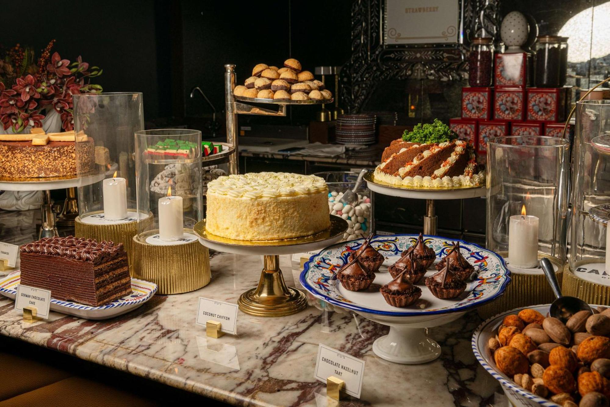 Mansard Riyadh, A Radisson Collection Hotel מראה חיצוני תמונה A dessert buffet